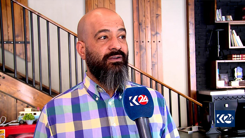 Abid Qasas, a restaurant owner in Erbil, being interviewed by Kurdistan 24, April 10, 2022. (Photo: Azar Faruq/Kurdistan 24)